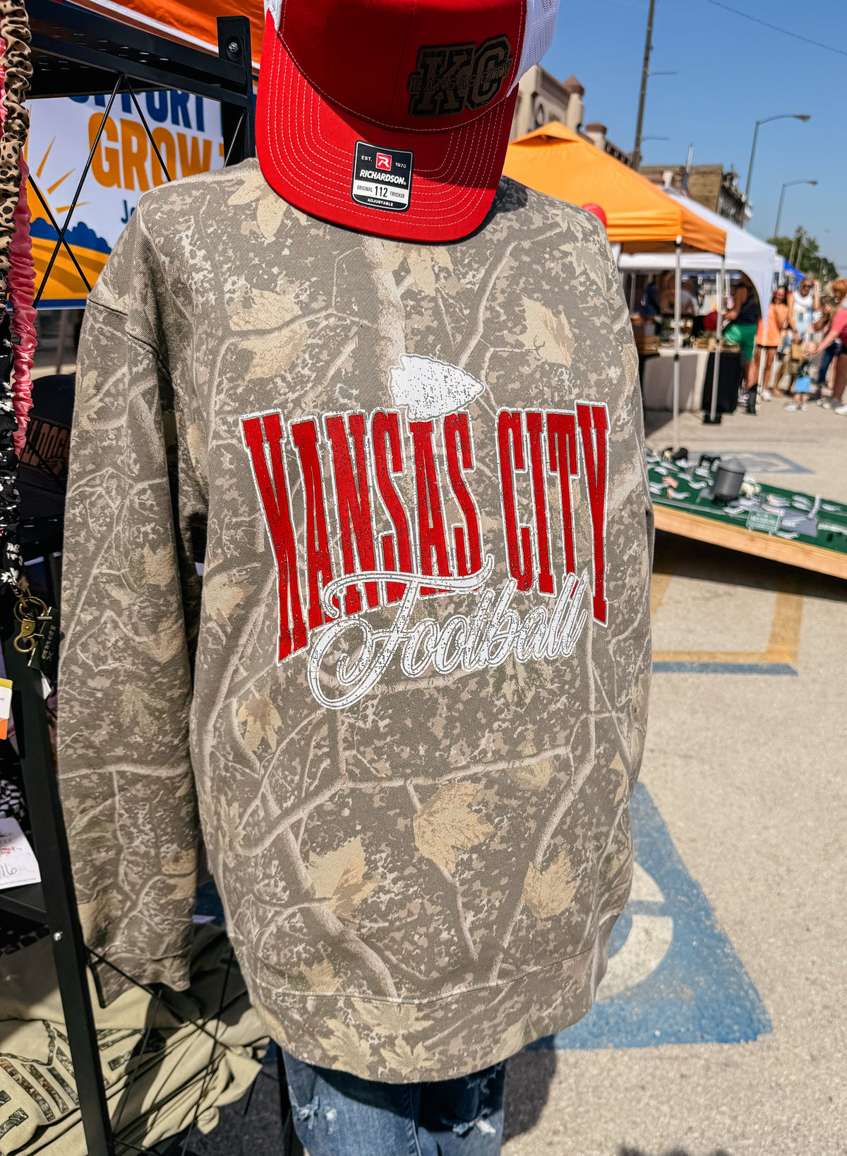 Kansas City football camouflage crewneck sweatshirt with distressed red and white football graphic, trendy KC game day apparel